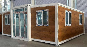 Expandable Folding House with Sloping Roof