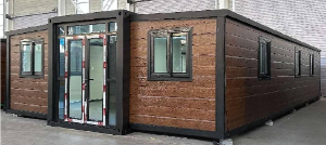 Expandable Folding House with Sloping Roof
