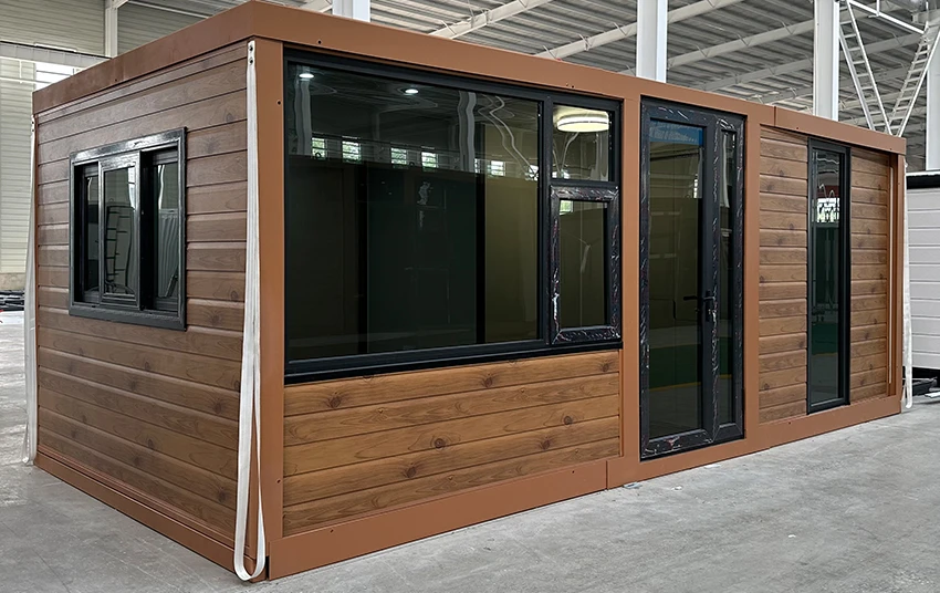 Expandable Folding House with Flat Roof
