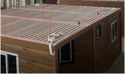 Expandable Folding House with Flat Roof
