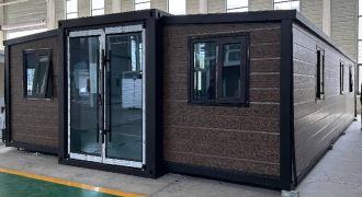 Expandable Folding House with Sloping Roof