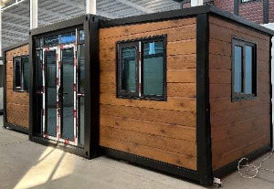 Expandable Folding House with Sloping Roof