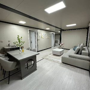 Expandable Folding House with Sloping Roof