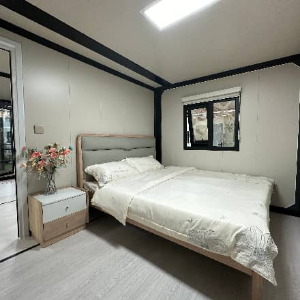 Expandable Folding House with Sloping Roof