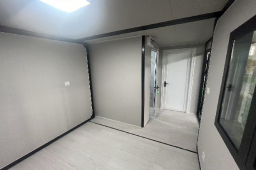 Expandable Folding House with Flat Roof