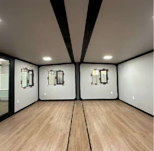 Expandable Folding House with Sloping Roof