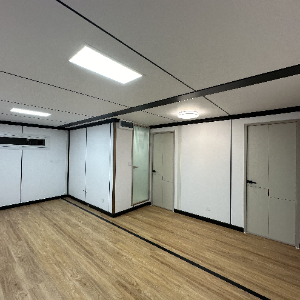 Expandable Folding House with Sloping Roof