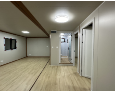 Expandable Folding House with Flat Roof