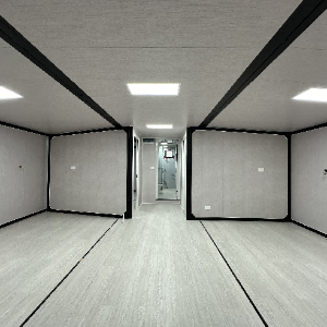 Expandable Folding House with Sloping Roof