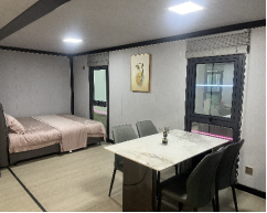 Expandable Folding House with Flat Roof